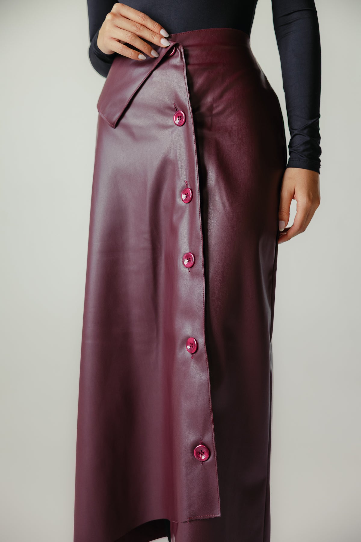Asymmetrical leather skirt in Burgundy