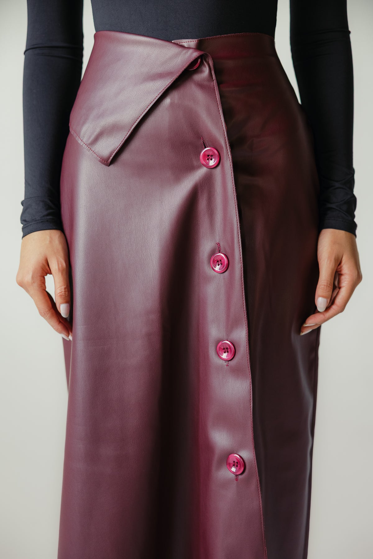 Asymmetrical leather skirt in Burgundy
