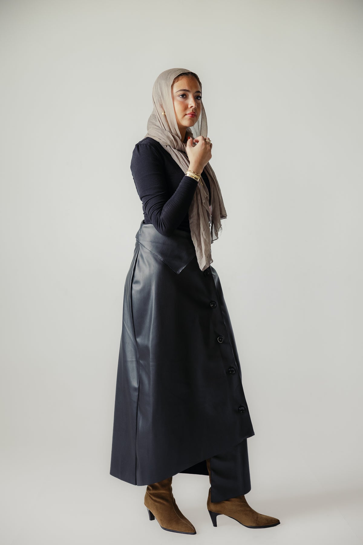 Asymmetrical leather skirt in Black