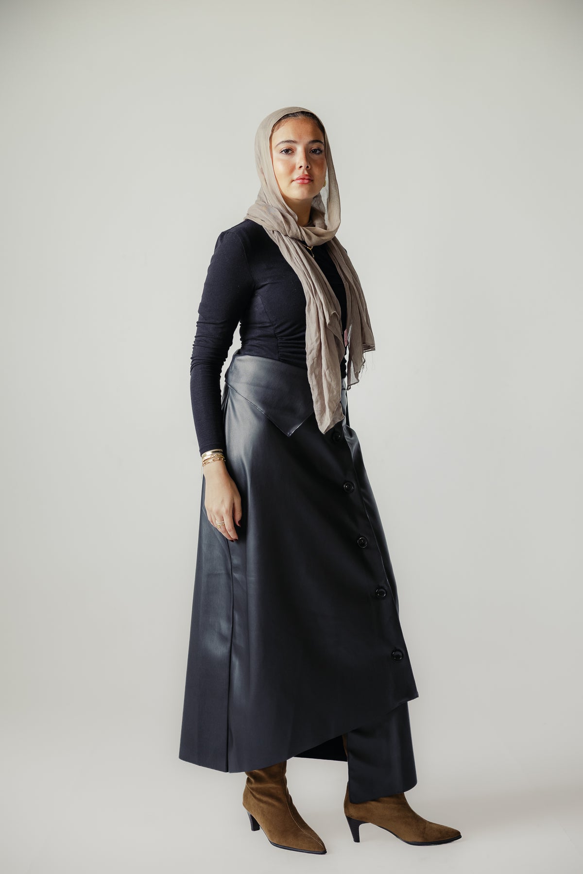 Asymmetrical leather skirt in Black